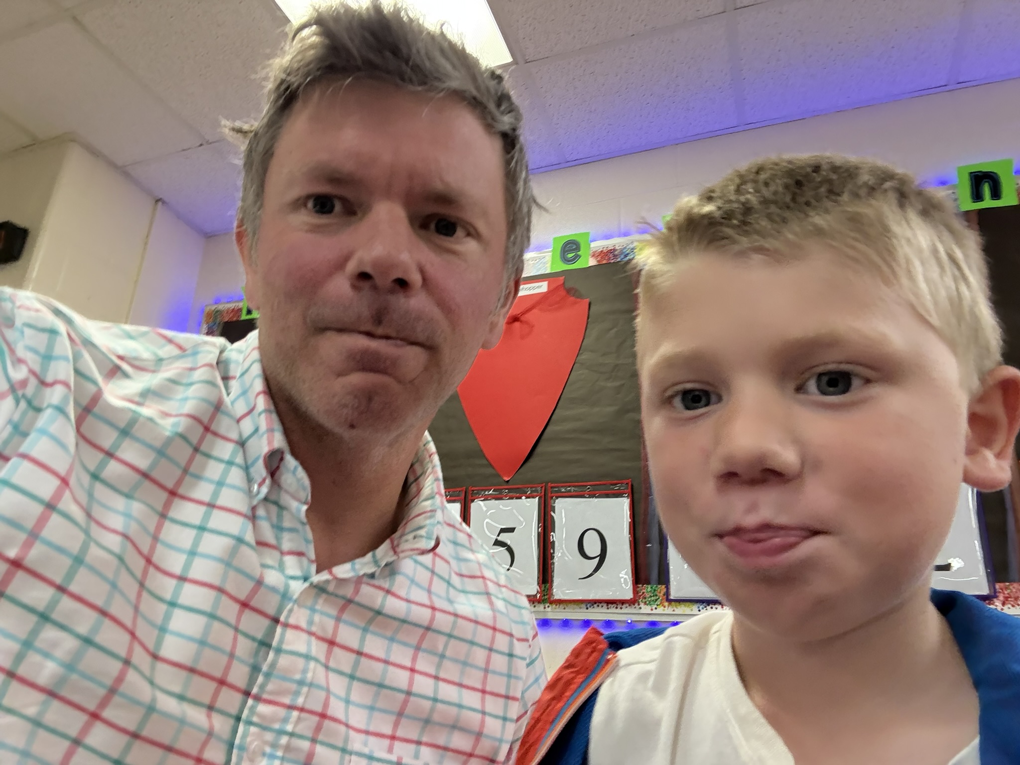 Teddy smiling selfie with dad