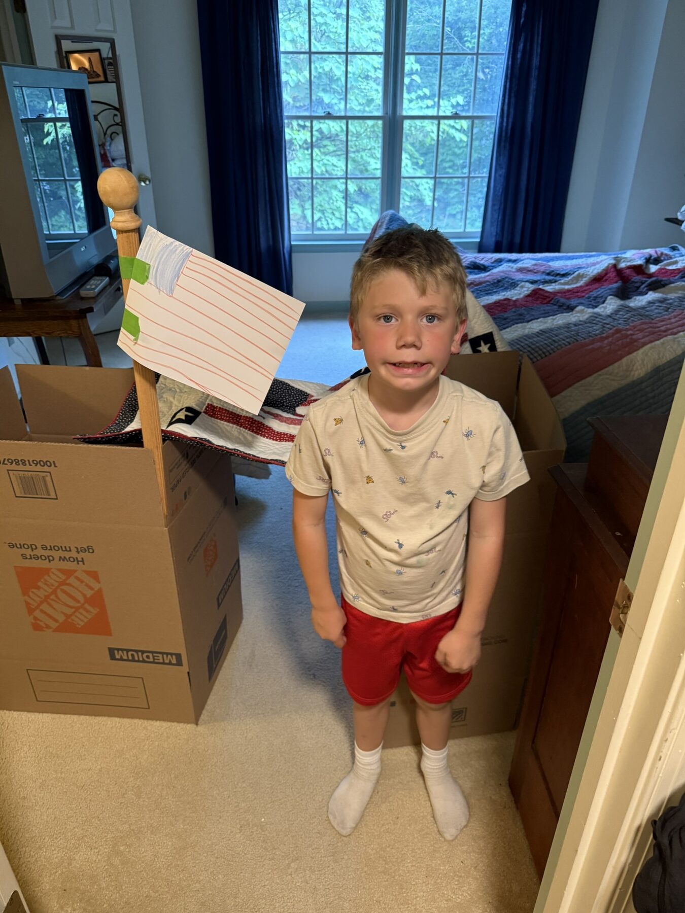 Teddy with his cardboard boat build
