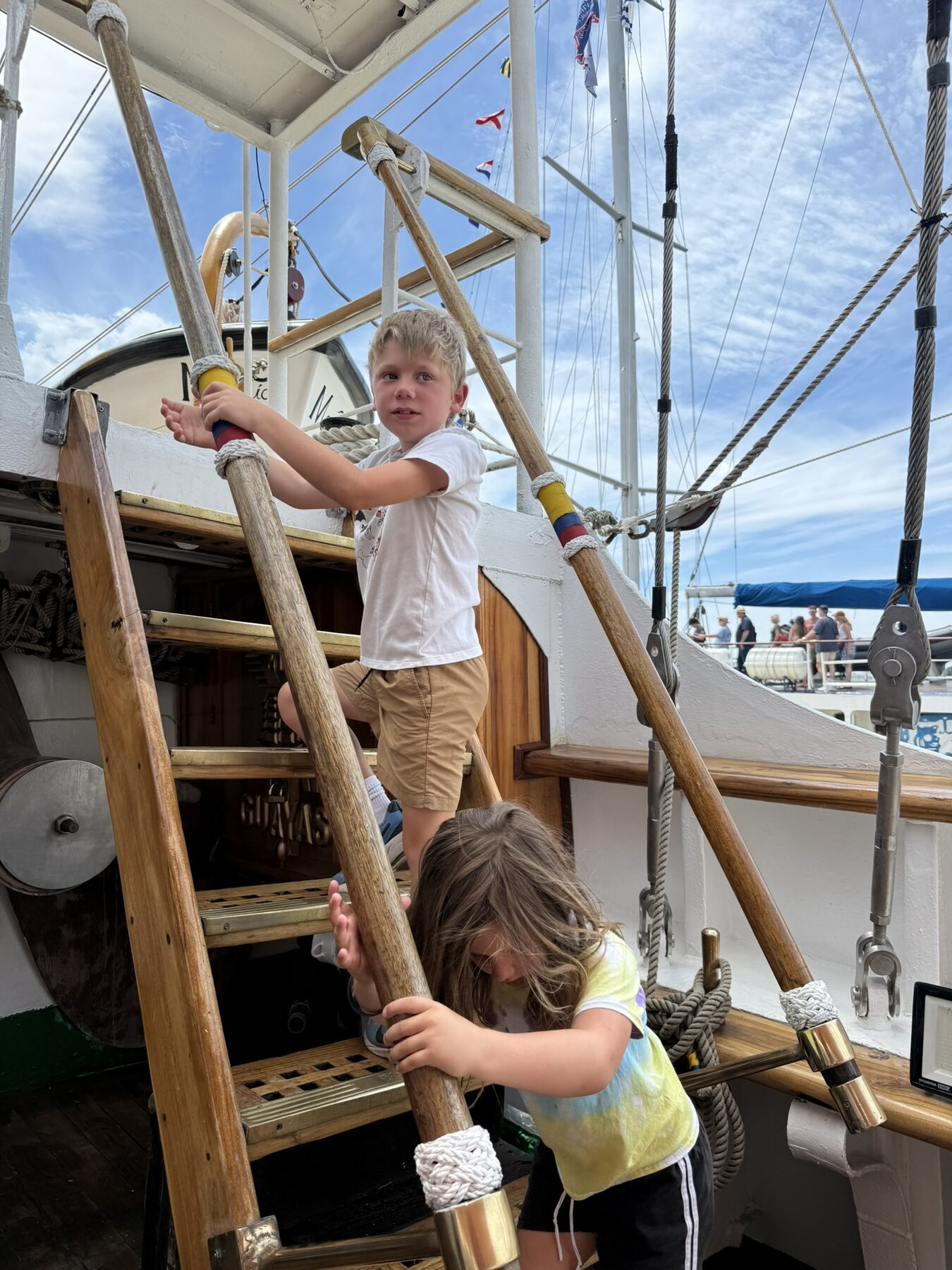 Teddy climbing the rigging of a tall ship